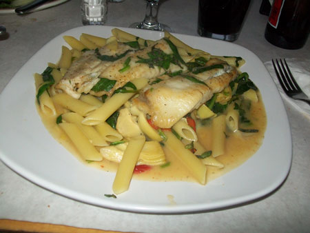 Pan roasted fluke with artichoke hearts, roasted peppers, spinach, basil & white wine sauce. Served with penne pasta